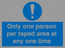 only-one-person-per-taped-area-at-any-one-time~